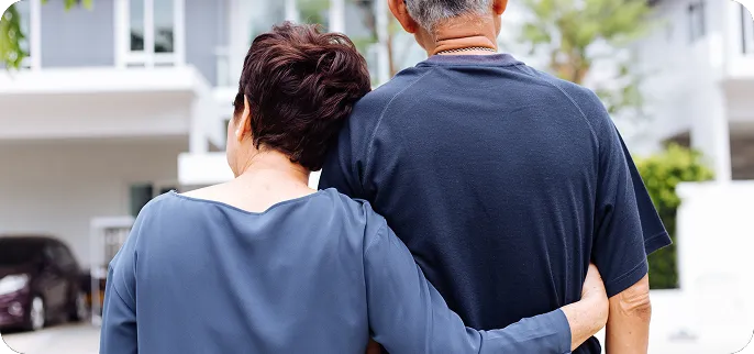 Older couple hugging