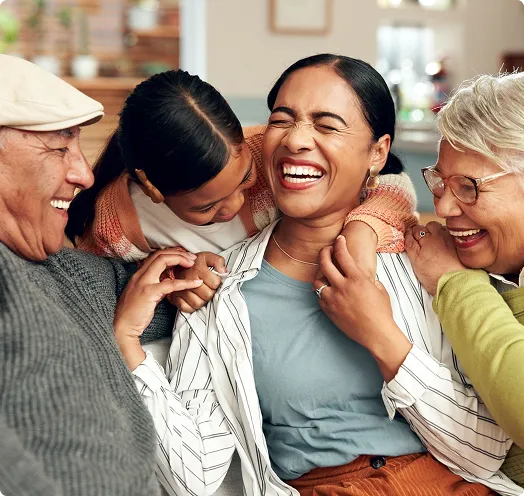 Family laughing and hugging