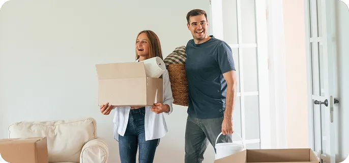 Couple with moving boxes - purchase loan