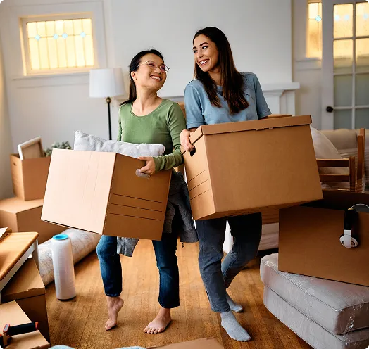 Two people with moving boxes - purchase loan