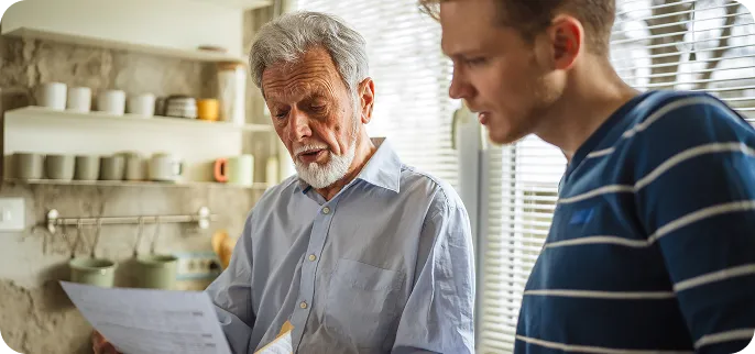 Father and son planning mortgage refinance