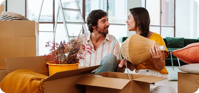 Couple with moving boxes